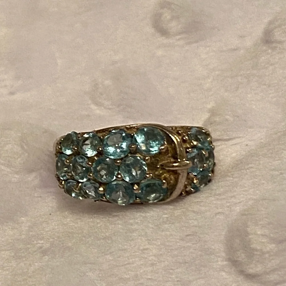 Cute Gold-toned Sterling Silver Buckle Band with Blue Topaz